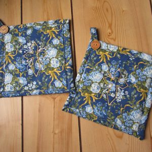 Old rugged embroidered cross potholder
